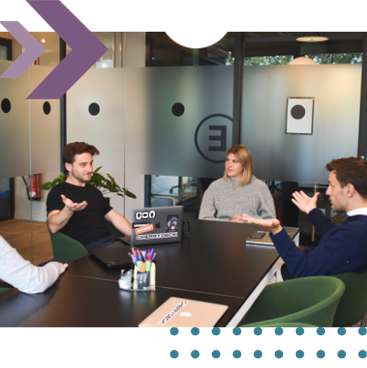 Insolvency solicitor leading a restructuring discussion around a meeting table