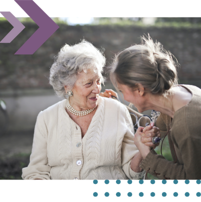 Private client solicitor advising a client on wills, trusts and estate planning outdoors.