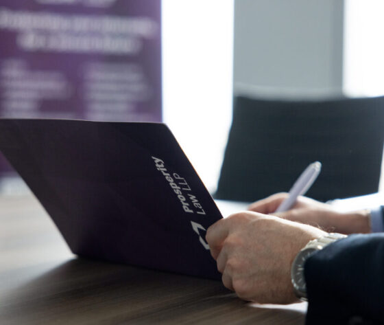 Man signing a document