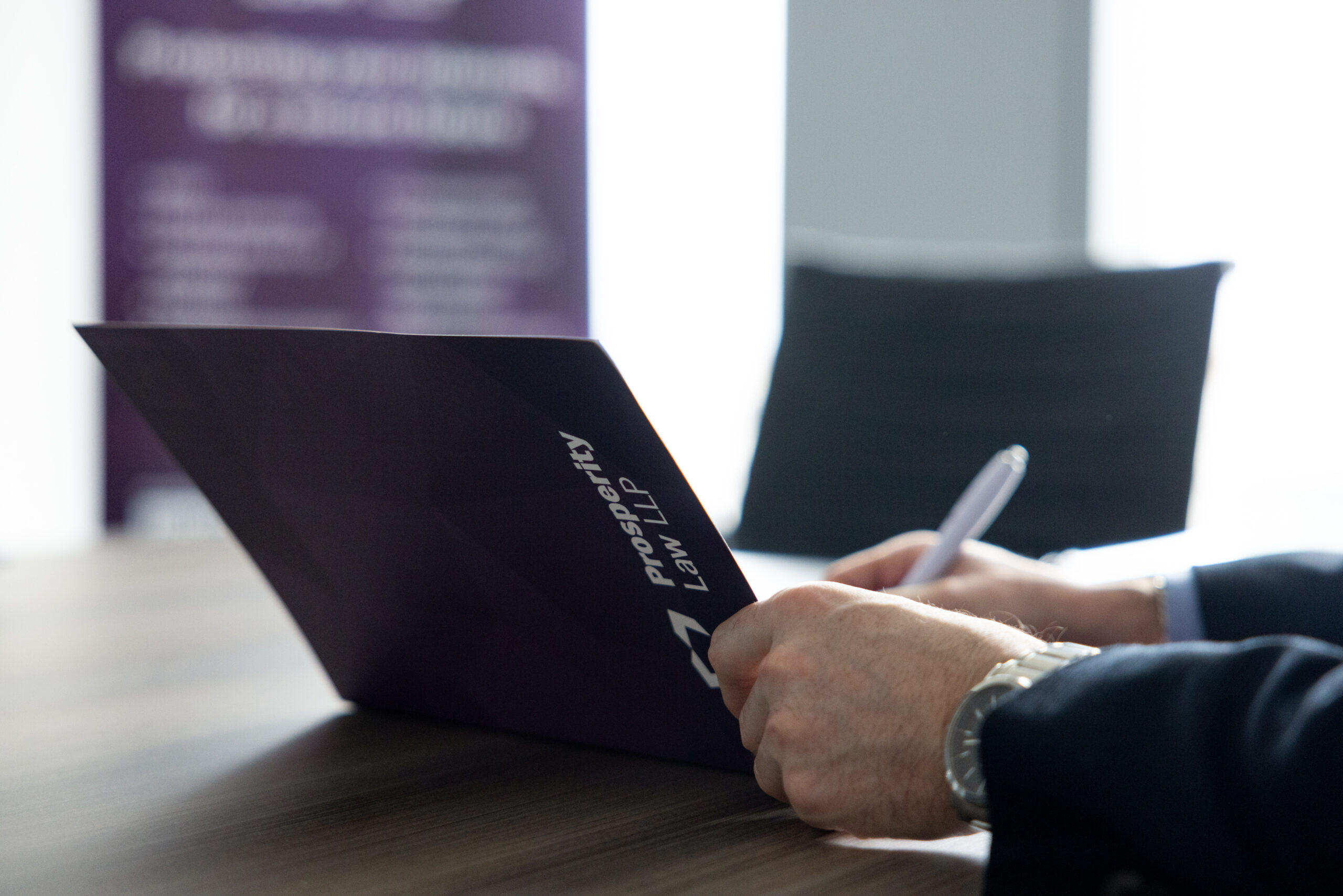 Man signing a document